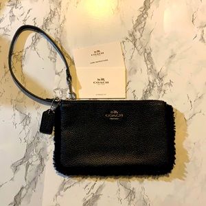 Coach black Wristlet with furry fuzzy border
